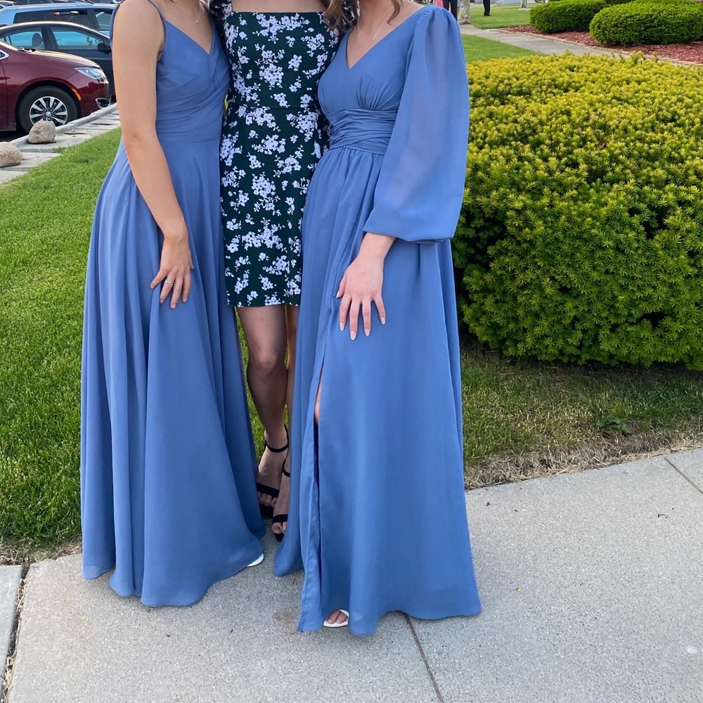 Long sleeved and backless drop waist bridesmaids dress.